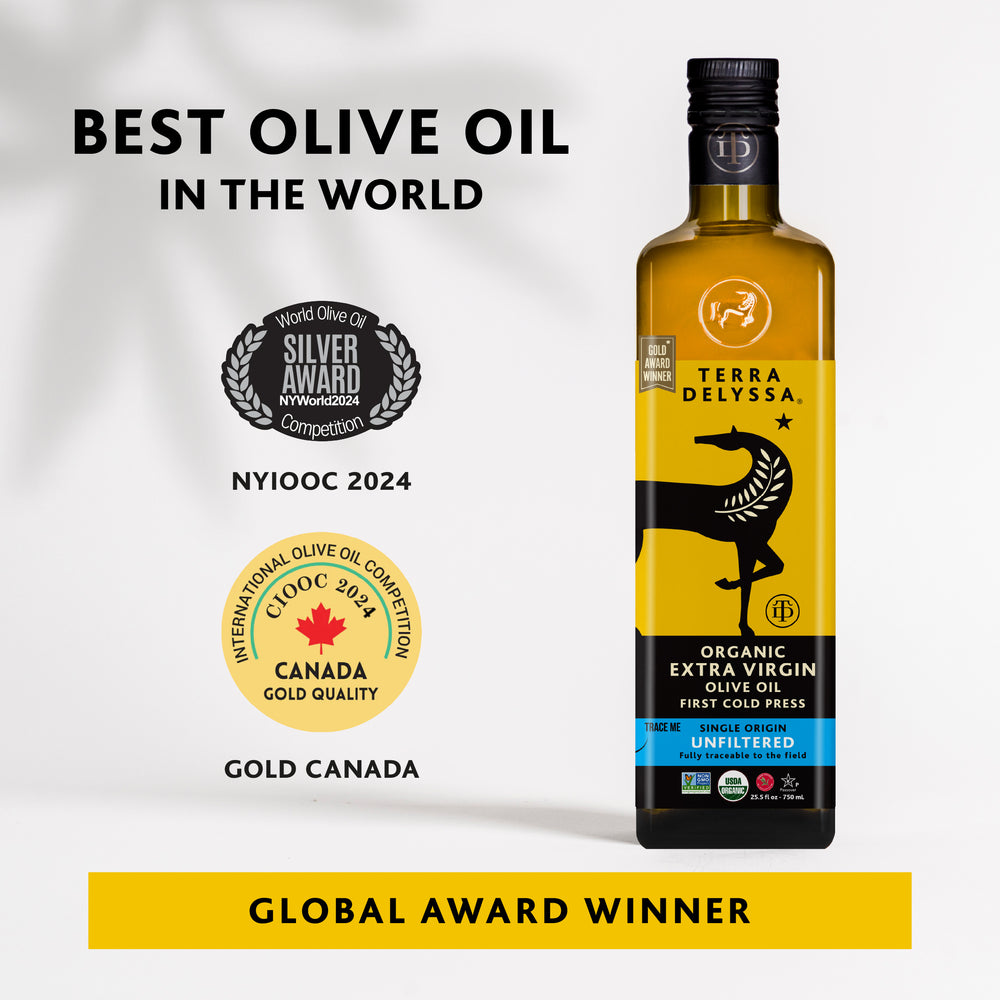 
                  
                    Bottle of Terra Delyssa olive oil with awards on a white background
                  
                