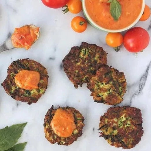 
                  
                    Grain-Free Zucchini Fritters with Roasted Heirloom Tomato and Garlic Compote
                  
                